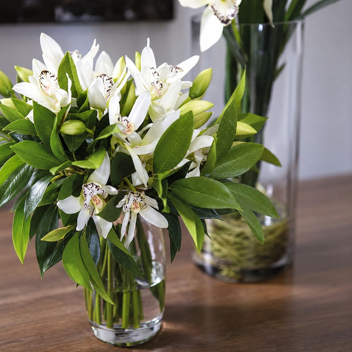 14"Hx15"W Silk Cymbidium Orchid Flower & Shikiba Arrangement w/Glass Vase -White/Green - WF9203-WH/GR