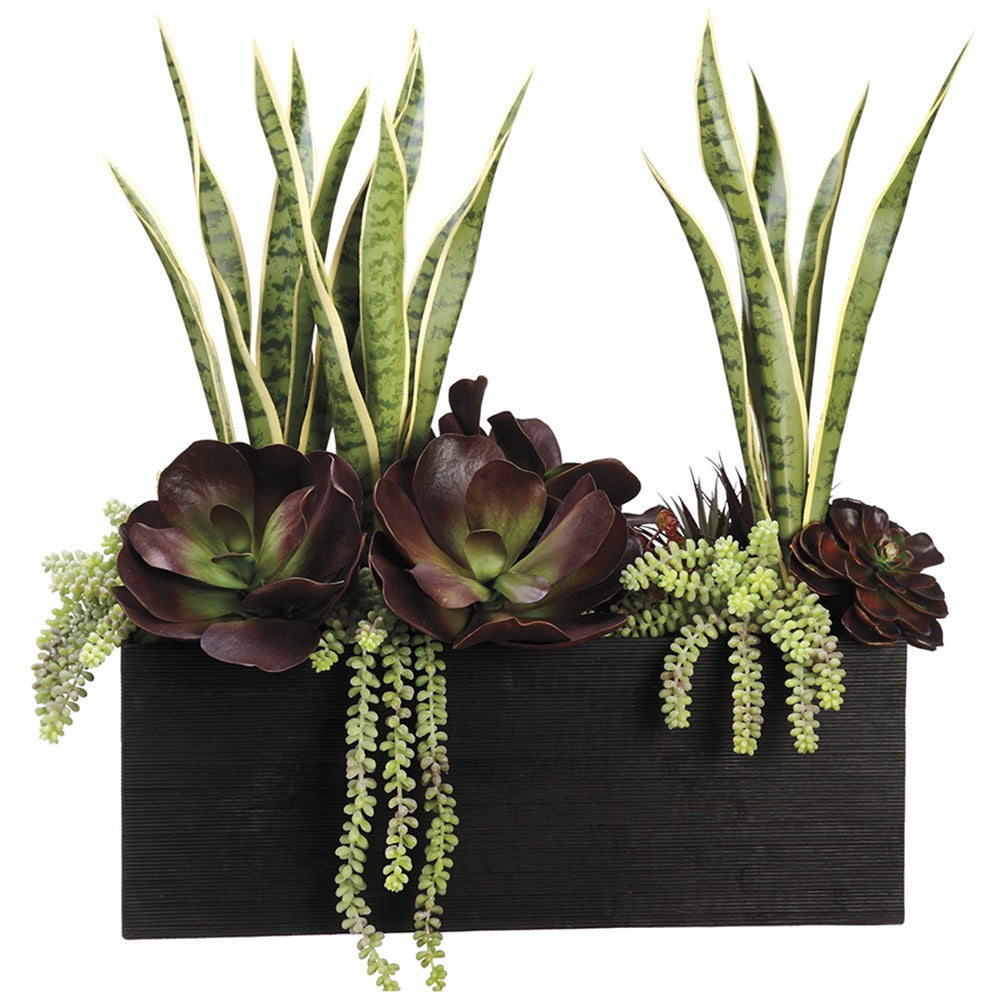 Artificial succulents in planter